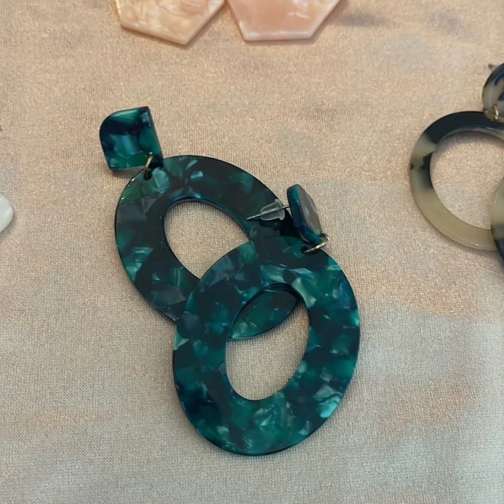 Five pairs of brand new lightweight earrings. Costume fun jewelry